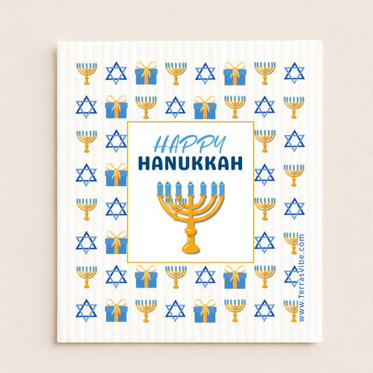 Happy Hanukkah cloth with menorah, stars of David, and presents on a white background.